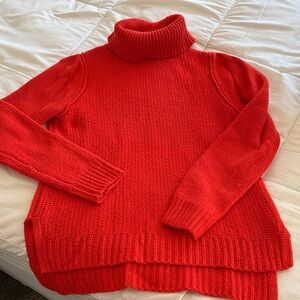 Jennifer Lopez Vibrant Orange Turtleneck Sweater